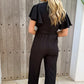 Elegante Jumpsuit met V-Hals en Strikceintuur