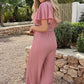 Elegante Jumpsuit met V-Hals en Strikceintuur