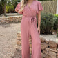 Elegante Jumpsuit met V-Hals en Strikceintuur
